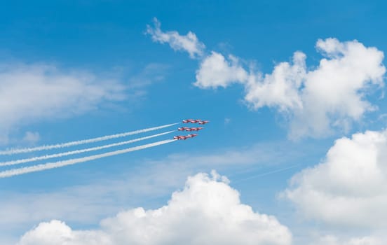 Royal Air Force stunt team red arrows in action on the Royal Dutch Air Force days 2014 in Gilze Rijen, Netherlands