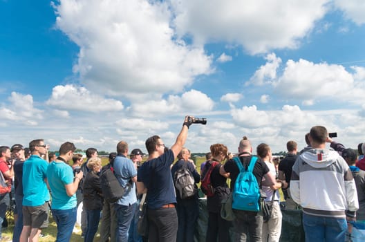 visitors of the dutch royal air force show 2014 in Gilze-Rijen, netherlands. The airbase was in 2 days visited by 245,000 visitors.