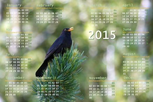 European 2015 year calendar with black bird on a branch