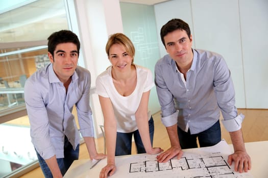 Group of architects working in office