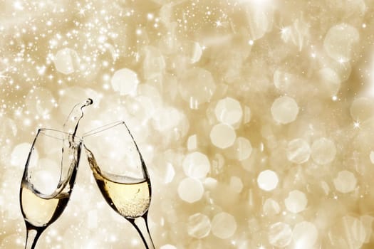 Champangne glasses on sparkling background