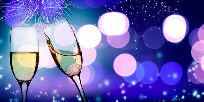 Champangne glasses on sparkling background