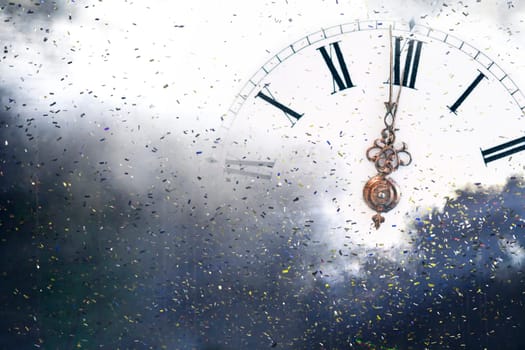 New Year's at midnight - Old clock with stars snowflakes and holiday lights