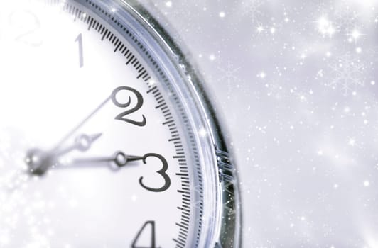 New Year's at midnight - Old clock with stars snowflakes and holiday lights