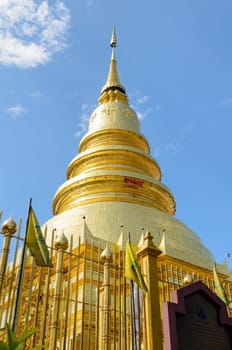 Golden pagoda place for storage relics of the Buddha at Wat Phra That Hariphunchai temple in Lamphun Province Thailand