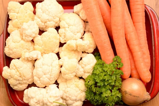 Fresh vegetables on a ceramic plate