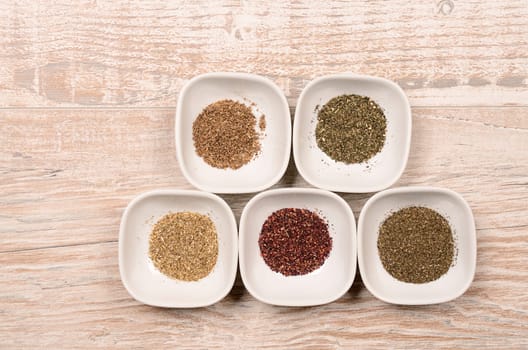 Tea assortment on an old rustic wooden background