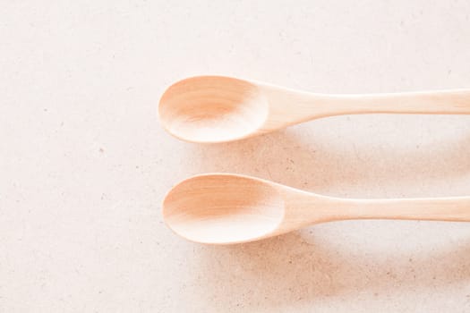 Closeup top view of wooden spoons, stock photo