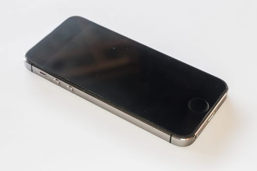 Beautiful metal smartphone isolated on white background, stock photo