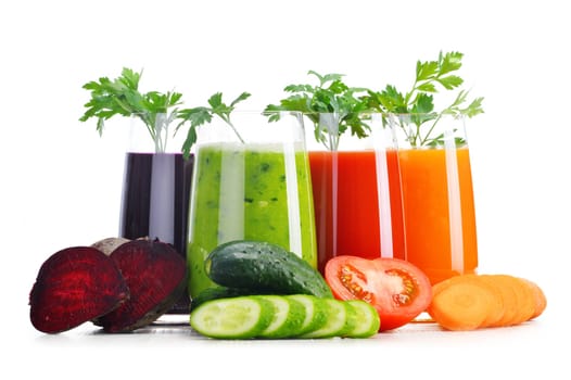 Glasses with fresh vegetable juices isolated on white. Detox diet.
