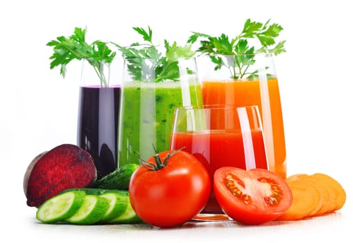 Glasses with fresh vegetable juices isolated on white. Detox diet.