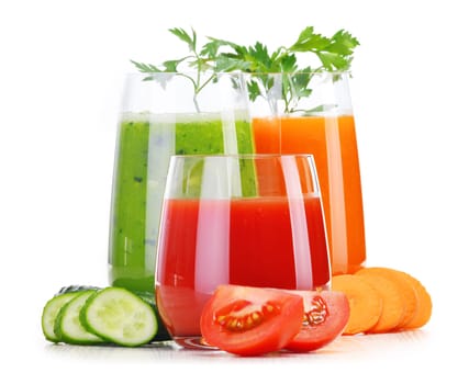 Glasses with fresh vegetable juices isolated on white. Detox diet.