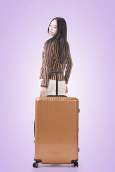 Modern Asian woman stand with a luggage.