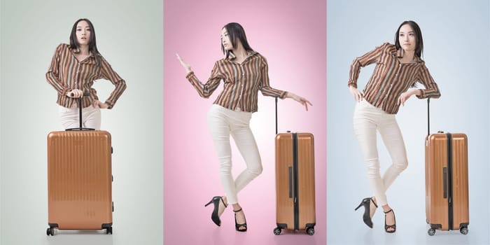 Travel concept with Asian beauty with a luggage in a set.