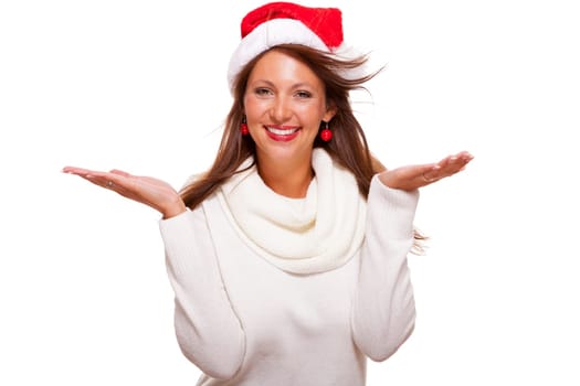 Young woman with Santa hat shows with her hands in the air on text-free presentation of seasonal products isolated on white background free-platers