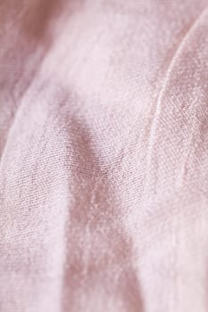 Light nettle linen Flax fabric in bright color with structure as close-up