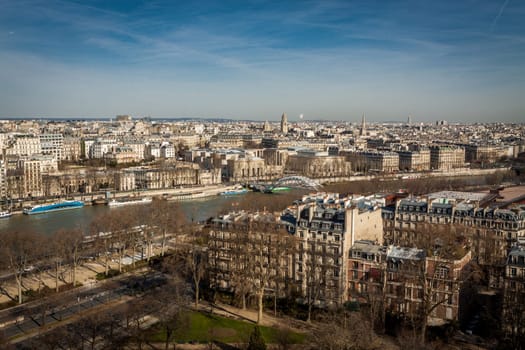 Skyline of Paris with cityscape on the Saine with blue sky in summer
