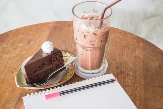 Easy meal of chocolate cake and drink, stock photo