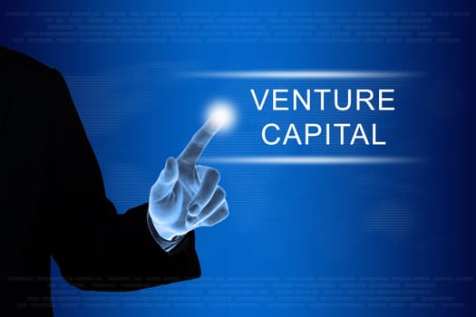 business hand pushing venture capital button on a touch screen interface