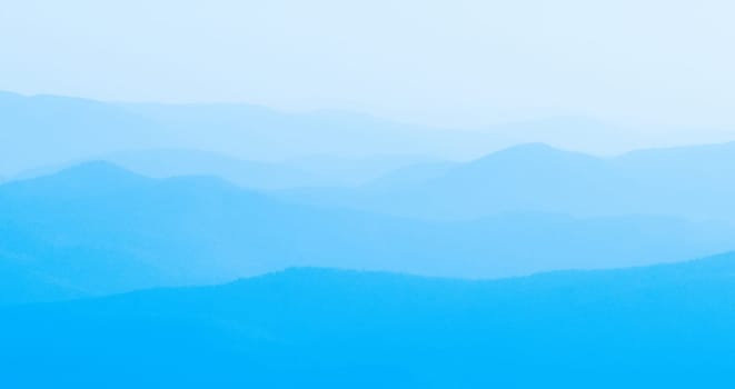 Panorama  of mountain ridges silhouettes
