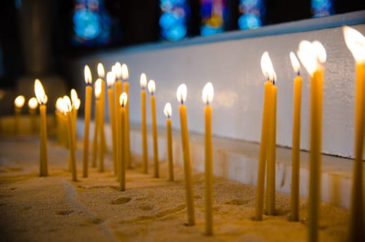candles in the Catholic Church, shallow depth of field