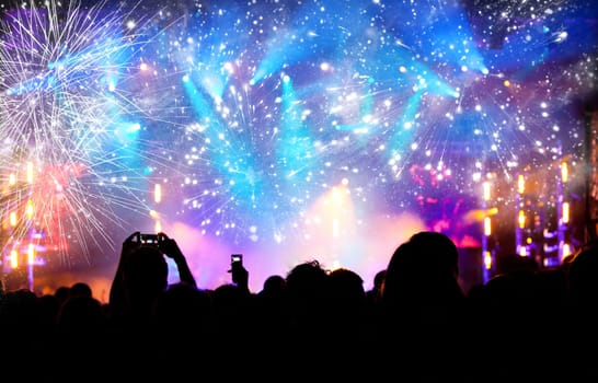 Fireworks and crowd celebrating the New year