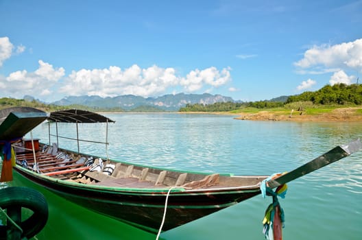 Long-tail boat waiting for the tourists at Ratchaprapa or Chiao Lan Dam in Surat Thani Province of Thailand