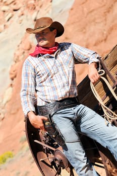 SOUTh WEST - A cowboy takes time to rest and reflect.