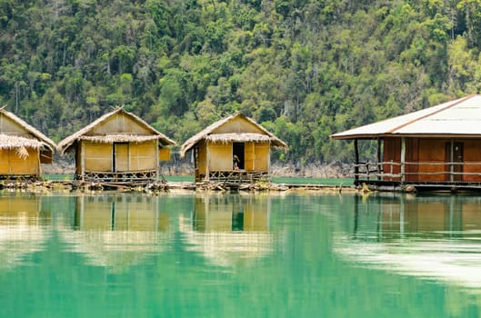 Small bungalow made of bamboo floating. Surrounded by mountains and water in Ratchaprapha Dam, Khao Sok National Park, Surat Thani Province, Thailand.