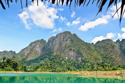 High mountain range above the green lake view from bungalow at Ratchapapha dam in Khao Sok National Park, Surat Thani province, Guilin of Thailand
