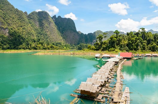 Small bungalow made of bamboo floating. Surrounded by mountains and water in Ratchaprapha Dam, Khao Sok National Park, Surat Thani Province, Thailand.