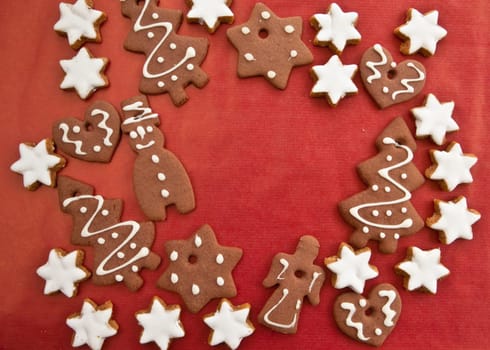 Rustic places and cinnamon stars on a red background