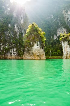Beautiful island and green lake in the morning at Ratchaprapha Dam, Khao Sok National Park, Surat Thani Province, Thailand ( Guilin of Thailand )