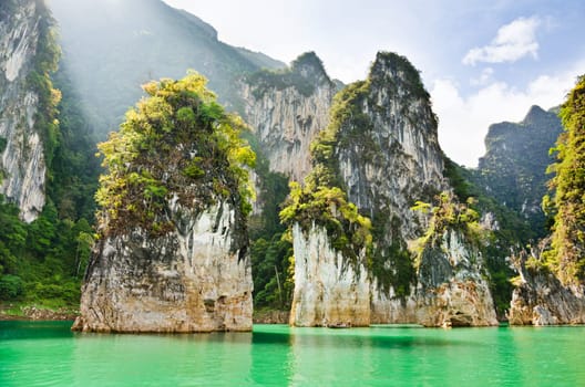 Travel island and green lake at Ratchaprapha Dam in Khao Sok National Park, Surat Thani Province, Thailand ( Guilin of Thailand )