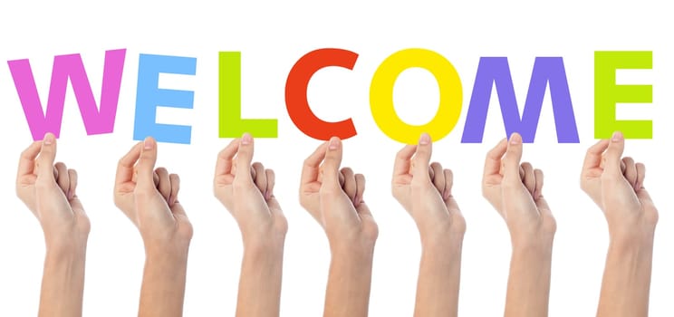 Diverse hands holding colorful words welcome