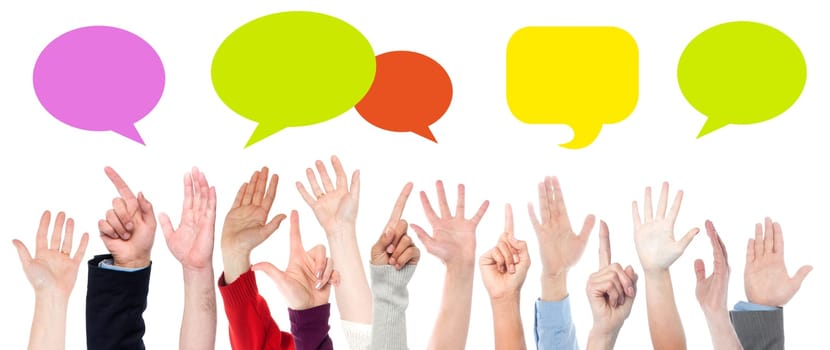 Hands raised up. Colorful speech bubbles.