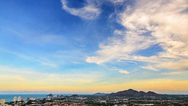 Hight angle view colorful sky over the Hua Hin city, Beautiful scenery town seaside at Prachuap Khiri Khan Province of Thailand