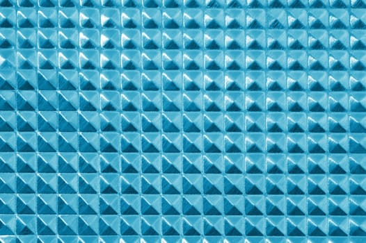 A close up shot of a metal background imprint