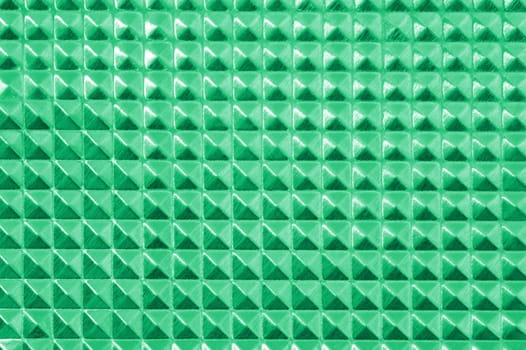 A close up shot of a metal background imprint