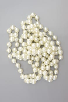 A close up shot of a pearl necklace