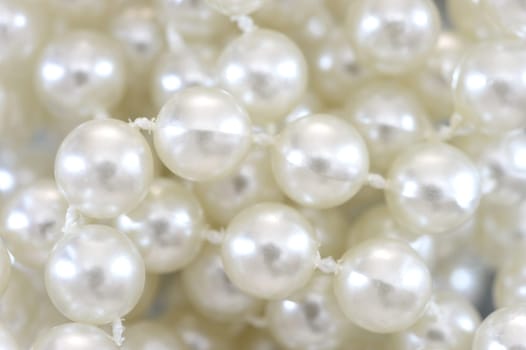 A close up shot of a pearl necklace