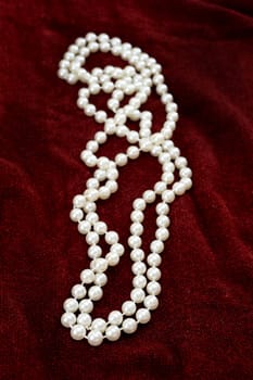 A close up shot of a pearl necklace