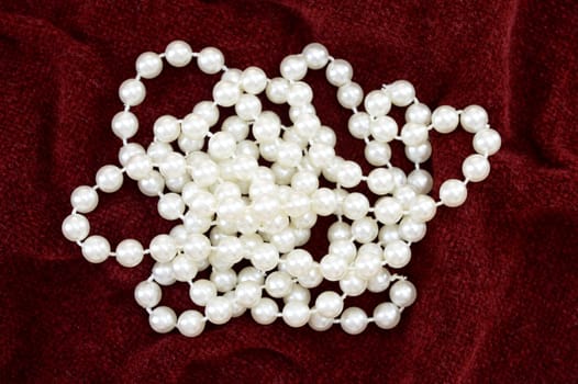 A close up shot of a pearl necklace