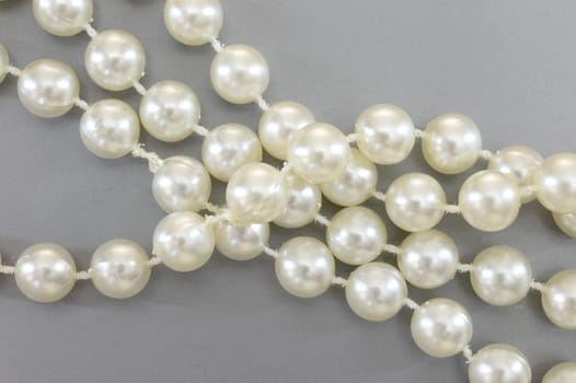 A close up shot of a pearl necklace