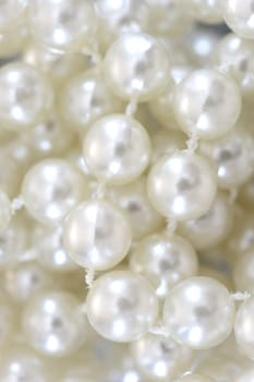 A close up shot of a pearl necklace