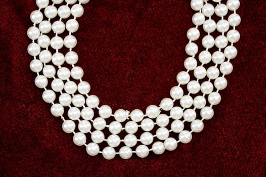 A close up shot of a pearl necklace