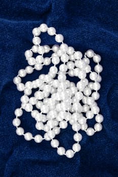 A close up shot of a pearl necklace