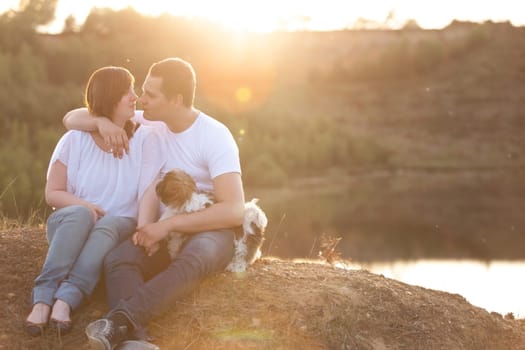 Young couple is having a romantic time in nature