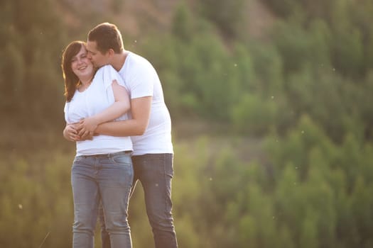 Young couple is having a romantic time in nature