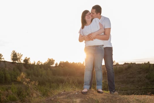 Young couple is having a romantic time in nature